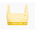 Yellow Maison femme ribbed bra top with MDLP shield and branded band.